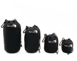 Reflex padded lens pouches in a row from largest to smallest against white background.