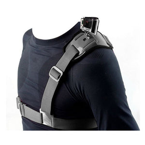 Person wearing a black shoulder strap mount harness with a GoPro camera attached for hands-free action filming