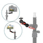 Double ball head magic arm clamp mounted on a light stand with camera and phone