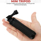 Compact tripod shown in a hand to demonstrate pocket-size portability and travel convenience